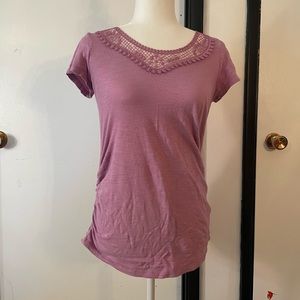 Lilac shirt with a crochet neck cinched sides for maternity stretch